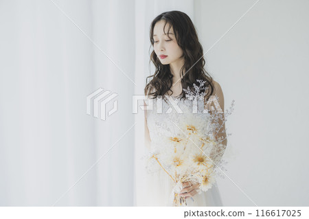 Woman in wedding dress Woman in wedding dress 116617025