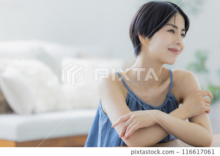 Woman in blue camisole Woman in blue camisole 116617061