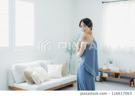 Woman in blue camisole 116617063