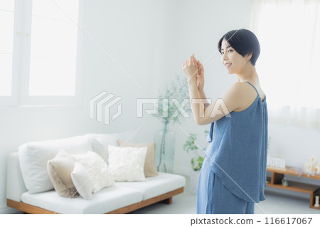 Woman in blue camisole 116617067