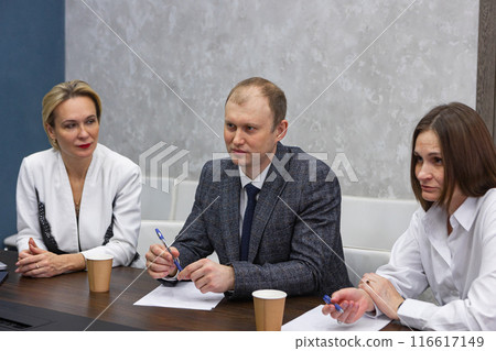 Business meeting in modern office. Business meeting in modern office. 116617149