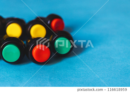 Several push Button Switch on top of a blue table Several push Button Switch on top of a blue table 116618959