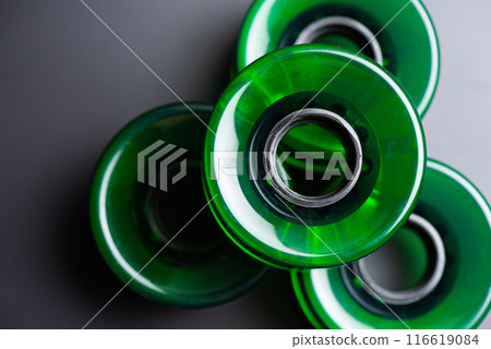 Green skateboard wheels 116619084