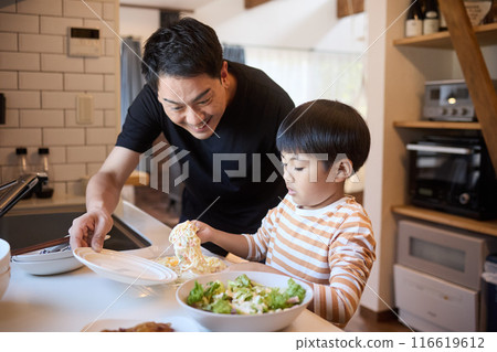 Father and son serving side dishes Father and son serving side dishes 116619612