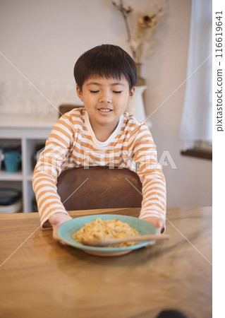Boy carrying food Boy carrying food 116619641
