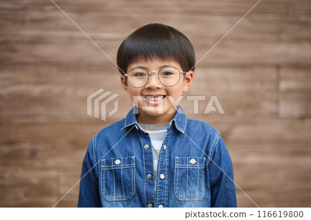 A boy with glasses 116619800
