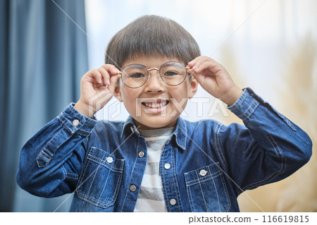 A boy with glasses A boy with glasses 116619815