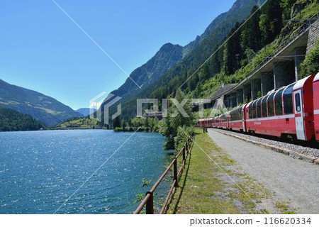 The roads around Lake Poschiavo are unpaved but well maintained and safe. The roads around Lake Poschiavo are unpaved but well maintained and safe. 116620334