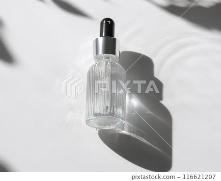 Cosmetic eyedropper container, transparent bottle and shadow, white background 116621207