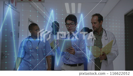 Image of heart rate montior against team of diverse doctors discussing together at hospital Image of heart rate montior against team of diverse doctors discussing together at hospital 116622052