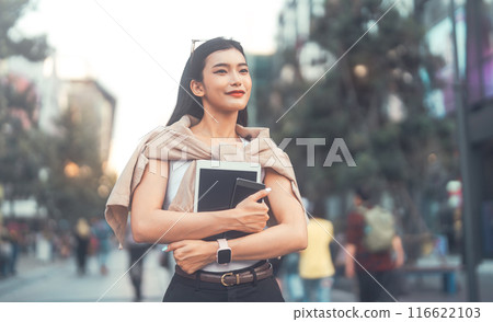 Youth asian woman using digital tablet urban teenager gen z lifestyles in city Youth asian woman using digital tablet urban teenager gen z lifestyles in city 116622103