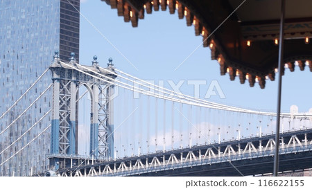 New York City Manhattan Bridge to Brooklyn Dumbo. Retro vintage carousel, USA travel destination. New York City Manhattan Bridge to Brooklyn Dumbo. Retro vintage carousel, USA travel destination. 116622155