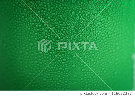 water drop on green beverage cans background, texture of cold aluminium package 116622382