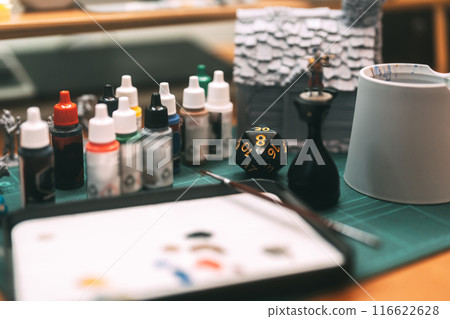 Brush paint acrylic colour to miniatures for tabletop role playing game or board games 116622628