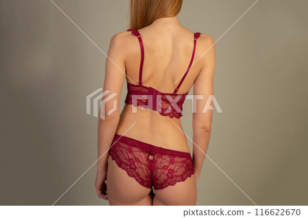 Woman with scoliosis of the spine. Curved woman's back with acne skin. 116622670