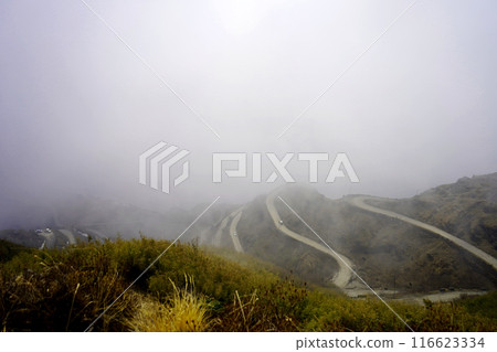 THE ZIG ZAG ROAD COVERED WITH CLOUD IN SILK ROUTE SIKKIM 116623334