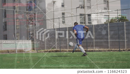 Image of interface processing data over african american male footballer kicking ball on pitch Image of interface processing data over african american male footballer kicking ball on pitch 116624323