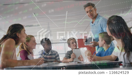 Image of trading board over male teacher showing digital pc to multiracial students in classroom Image of trading board over male teacher showing digital pc to multiracial students in classroom 116624529