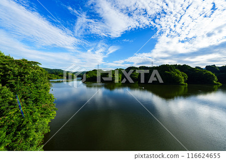 Summer 2024 Clouds passing over Nunome Dam Lake and the changing reflections on the lake surface From before sunset to the night view #10 Summer 2024 Clouds passing over Nunome Dam Lake and the changing reflections on the lake surface From before sunset to the night view #10 116624655
