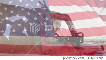 Image of flag of usa over happy caucasian woman in car by beach in summer 116624704