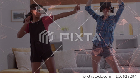 Image of data processing over diverse women using vr headsets Image of data processing over diverse women using vr headsets 116625294
