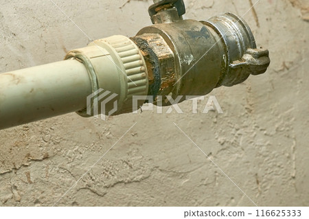 Plumbing. Sewerage. Water valve shutting off the water tap in the basement Plumbing. Sewerage. Water valve shutting off the water tap in the basement 116625333