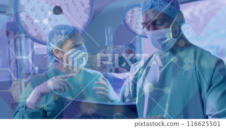 Image of scientific data processing over diverse surgeons in hospital 116625501