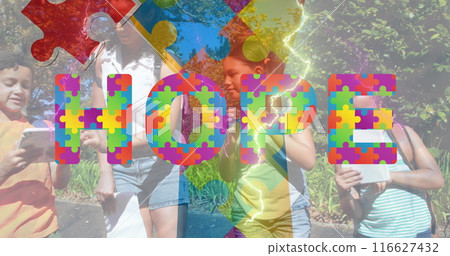 Images of colorful puzzle pieces and hope text over diverse group of children Images of colorful puzzle pieces and hope text over diverse group of children 116627432