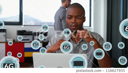 Image of 5g and 6g text with symbols over thoughtful african american man working on laptop Image of 5g and 6g text with symbols over thoughtful african american man working on laptop 116627935