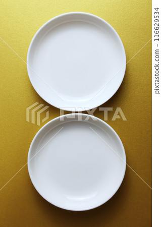 Two plates and a gold background Two plates and a gold background 116629534
