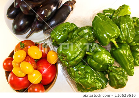 Freshly picked summer vegetables: tomatoes, peppers, eggplants 116629616