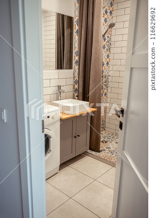 white rectangular sink and faucet in the bathroom white rectangular sink and faucet in the bathroom 116629692