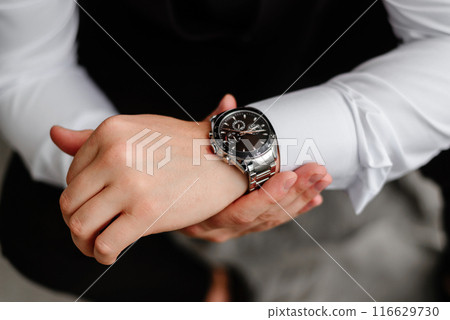 wedding preparations, groom in a suit or tuxedo, marriage proposal 116629730