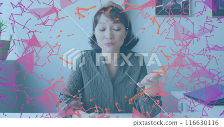 Image of plexus networks against asian woman having a image call at office 116630116