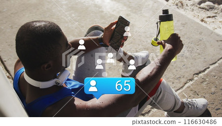 Image of people icons with numbers over african american male athlete with bottle using phone Image of people icons with numbers over african american male athlete with bottle using phone 116630486