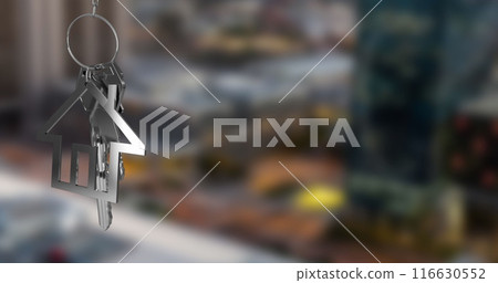 Image of hanging silver house keys against blurred view of cityscape with copy space 116630552