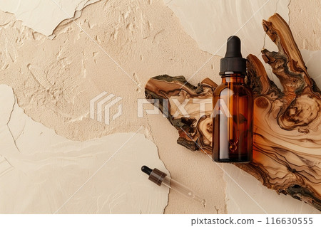 Dark amber glass bottle top view. Natural skin care SPA beauty product design. Mineral organic eco oil cosmetics on beige background. Mock-Up. Oily pipette. Face, body treatment. Flat lay, copy space 116630555