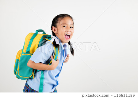 Portrait smile Asian little girl kindergarten holding a green and yellow backpack posing studio isolated white background, happy cute woman kid wear school uniform plaid skirt, back to school concept Portrait smile Asian little girl kindergarten holding a green and yellow backpack posing studio isolated white background, happy cute woman kid wear school uniform plaid skirt, back to school concept 116631189
