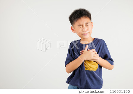 Young kid boy pressing on chest pain isolated on white background, painful expression heartache, primary children having heart attack heart disease, Painful cramps problem 116631190