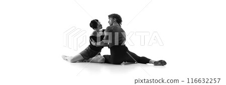 Banner. Young man and woman training together their ballet dance against white studio background. Copy space. Sepia filter. 116632257