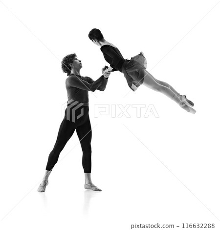 Ballet partners in practice. Dancer lifts ballerina in motion against white studio background. Sepia filter. 116632288