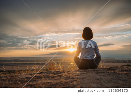 Meditate on a hilltop, soak in a sunset, reflect on natures tranquility to find serenity and peace 116634170