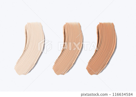 Set liquid foundation smudge on white background. Beauty skincare texture swipe swatch. Cosmetic makeup cream sample isolated on white 116634584