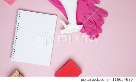 Various accessories cleaning products, sprays, rags, sponges and brushes. Mock up white notebook. Top view, flat lay, copy space 116634680