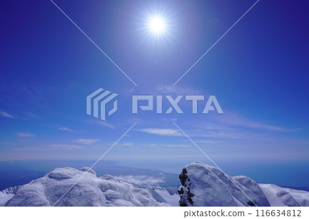 The Sea of Japan and the sun from the summit of Mt. Chokai in winter 116634812