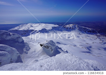 The ridgeline leading to Mt. Inakura and Mt. Shogatake from the summit of Mt. Chokai in winter The ridgeline leading to Mt. Inakura and Mt. Shogatake from the summit of Mt. Chokai in winter 116634918