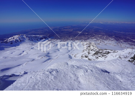 Snow fields and the Sea of Japan from the summit of Mt. Chokai in winter Snow fields and the Sea of Japan from the summit of Mt. Chokai in winter 116634919