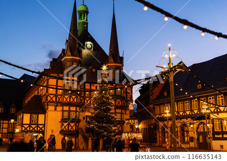Market square historic city hall Wernigerode in Harz region of Sachsen-Anhalt Land Germany evening night sky. Christmas decoration in old European small scenic town. Scenic Europe travel destination 116635143