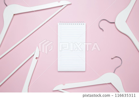 Creative flat lay hangers. Mockup to do list. Sale discount store promo shopping concept. Top view. Copy space 116635311