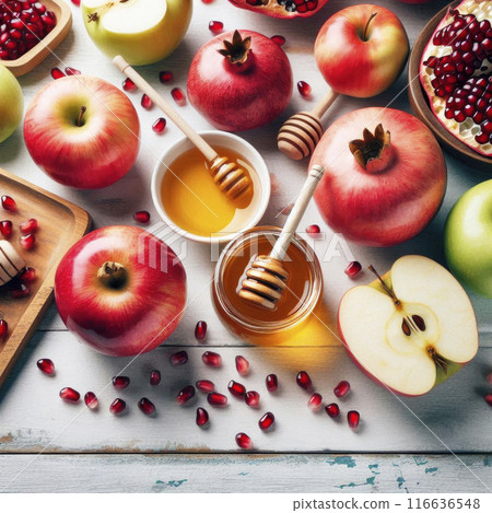 Still life of apples, honey, pomegranates on a wooden background. Celebration of the Jewish New Year, Rosh Hashana 116636548